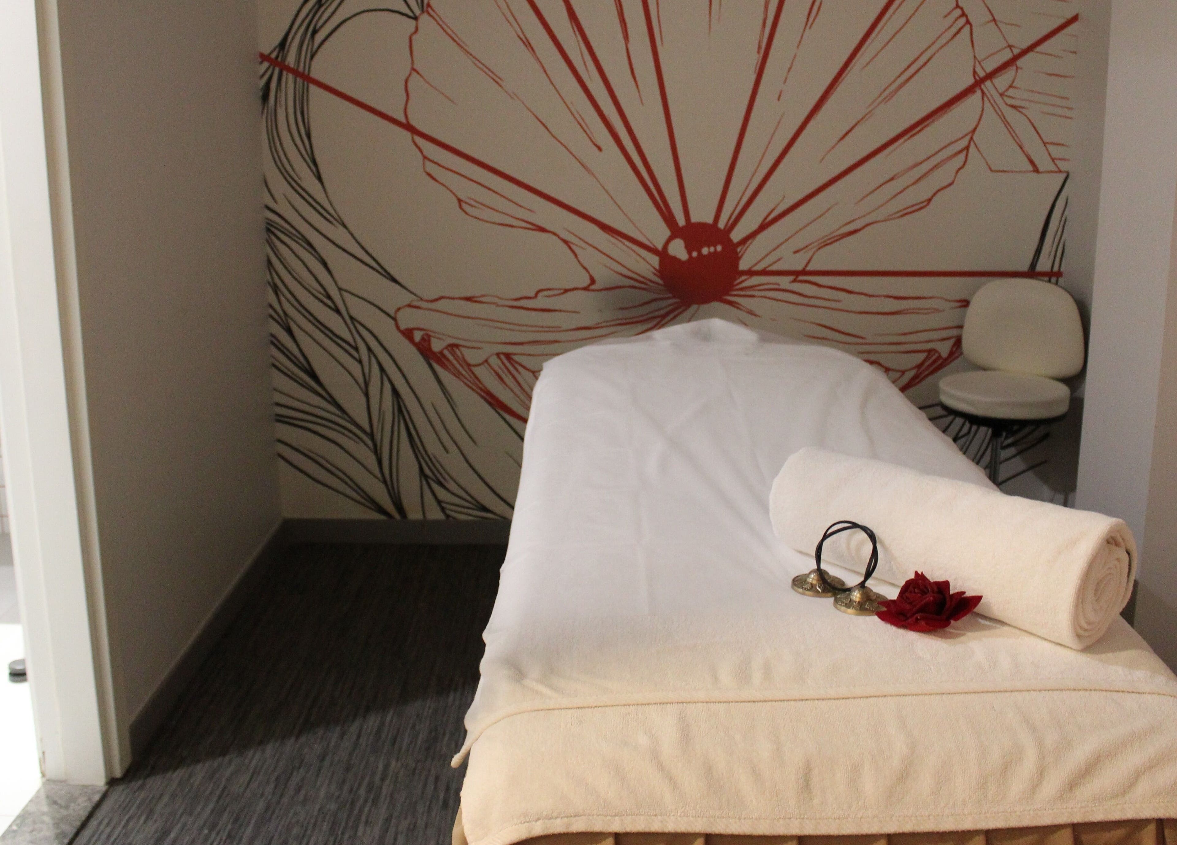 Relaxing massage room at DWS-Radisson Red Silicon Oasis, Dubai, Dubai, AE, with calming decor and plush towels.
