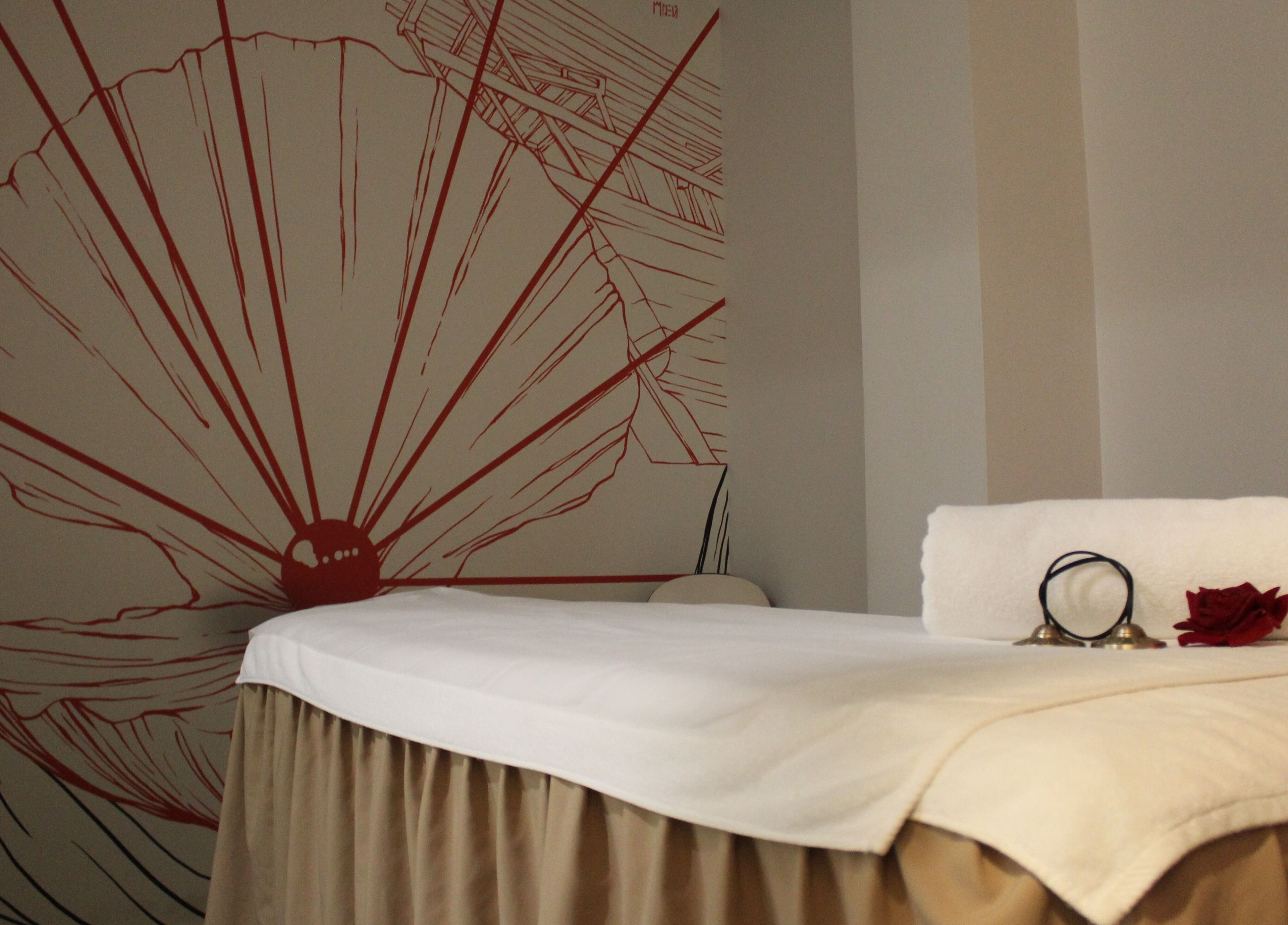 Relaxing treatment room at DWS-Radisson Red Silicon Oasis, Dubai, Dubai, AE featuring calming decor.