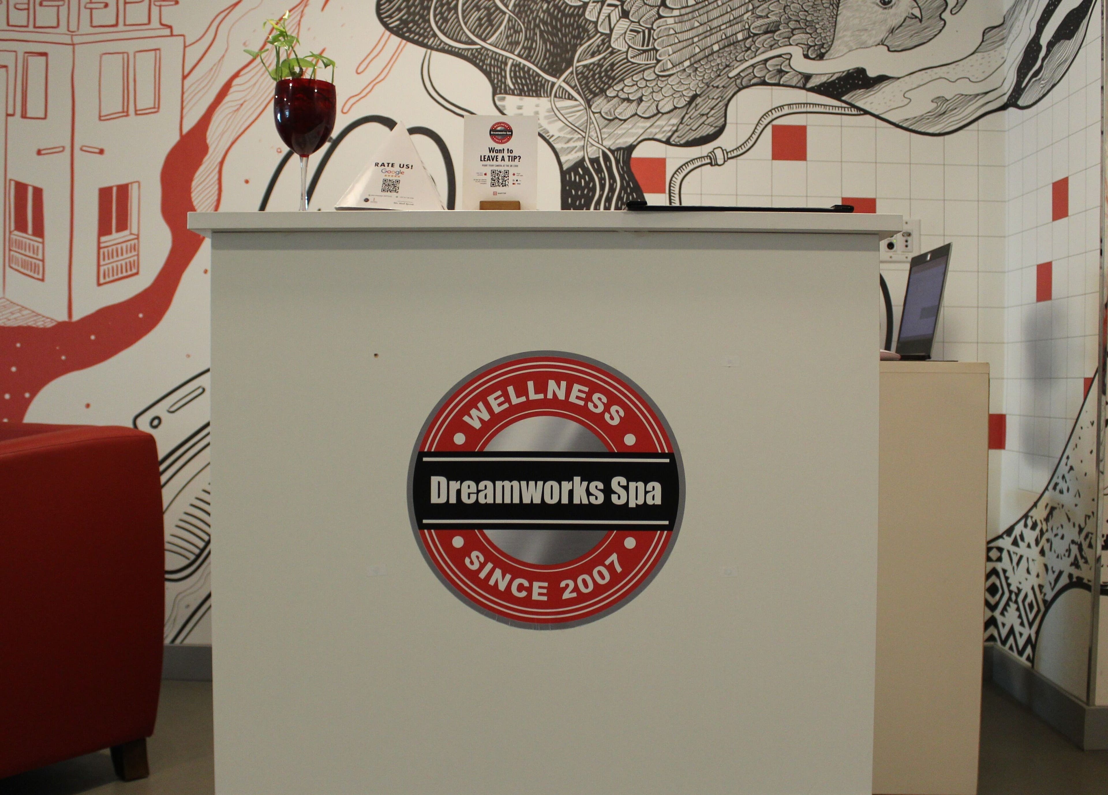 Reception area at DWS-Radisson Red Silicon Oasis, Dubai, AE with modern decor and spa branding.