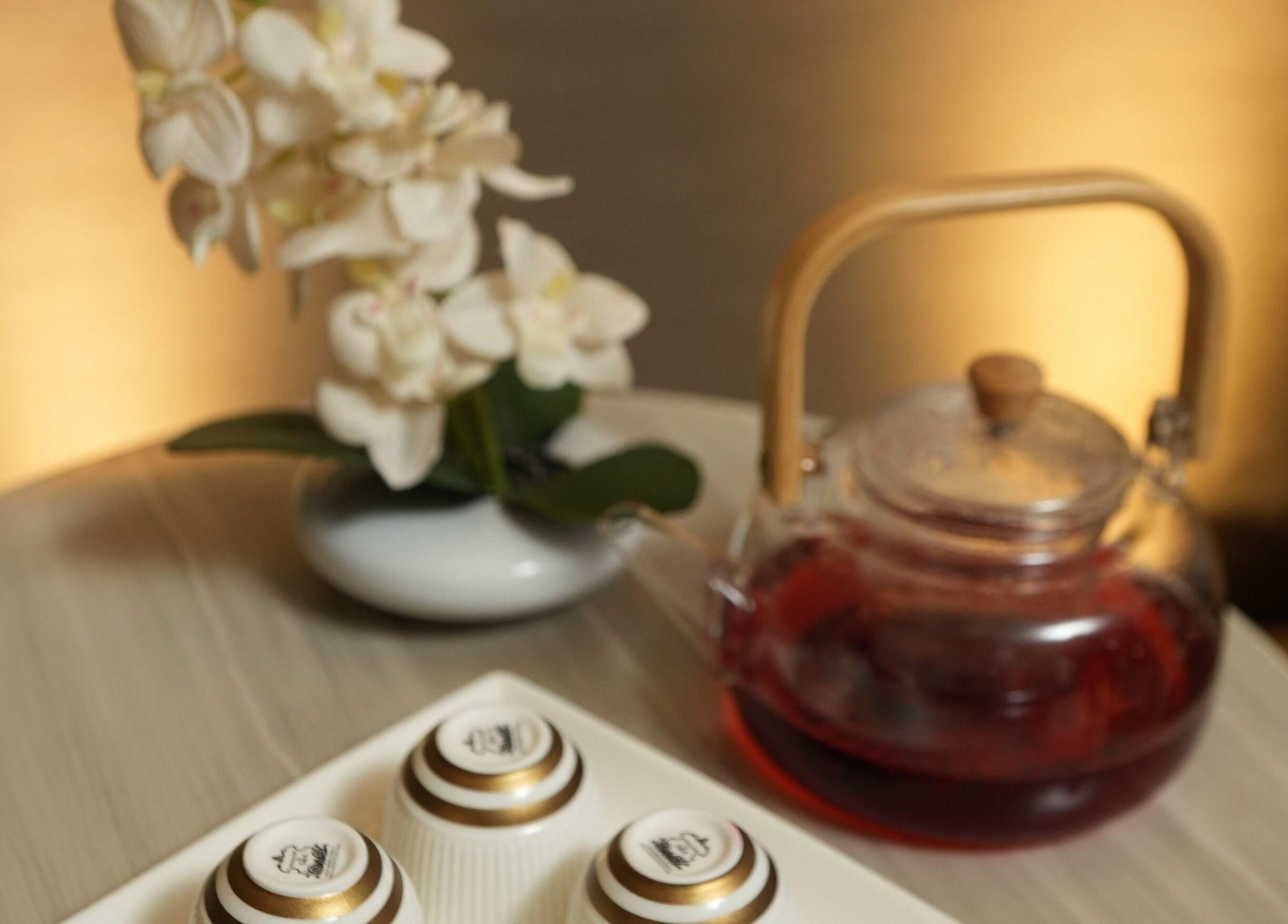 Elegant tea setting with orchids at DWS-Damac Aykon City, Dubai, Dubai, AE.