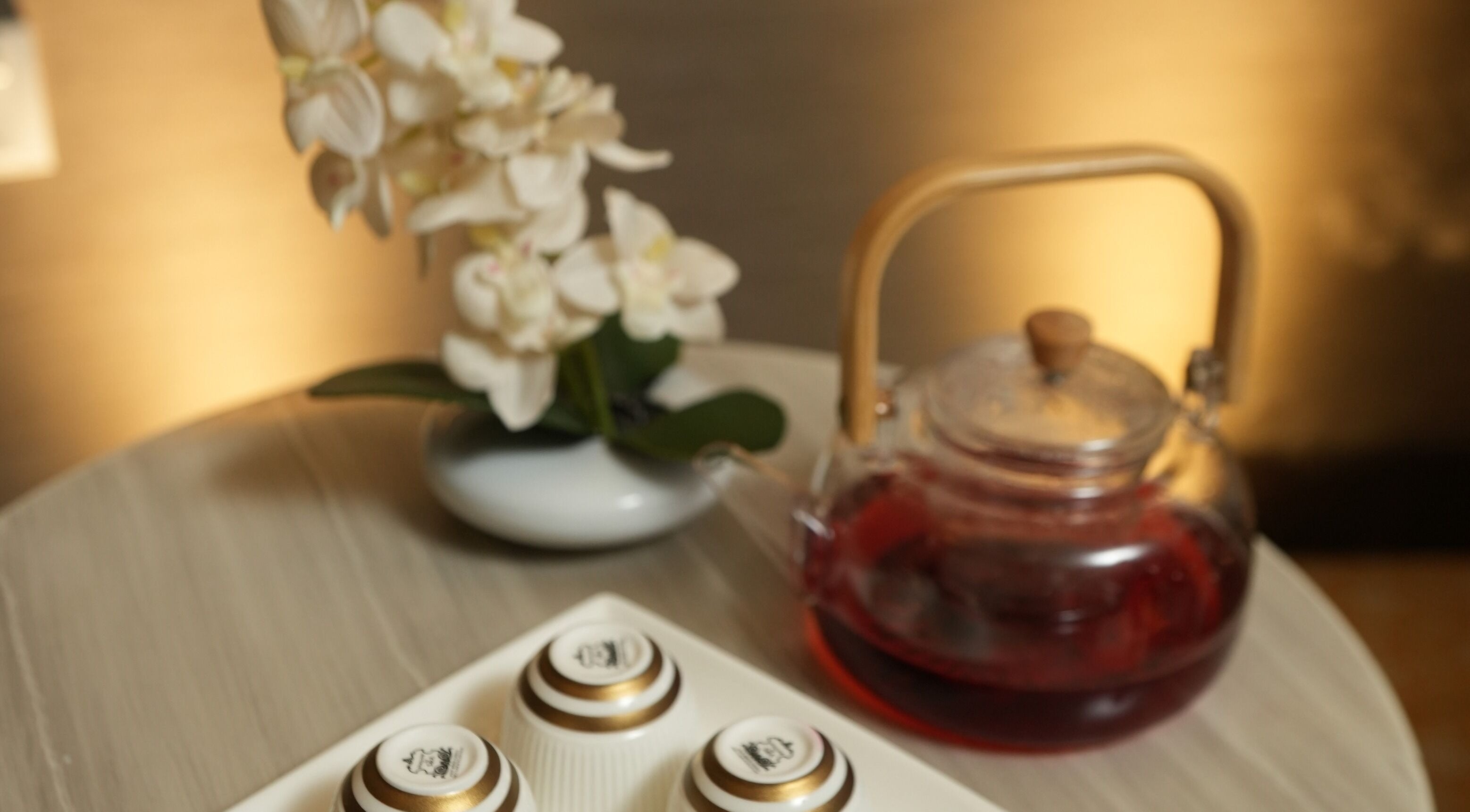 Elegant tea setting with orchids at DWS-Damac Aykon City, Dubai, Dubai, AE.