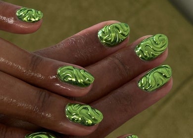 Green swirl nail art by Suki Nailz in London, England, GB. Showcasing intricate, glossy designs.