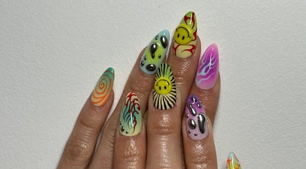 Vibrant nail art design from Suki Nailz at London, England, GB showcasing unique patterns and bold colors.