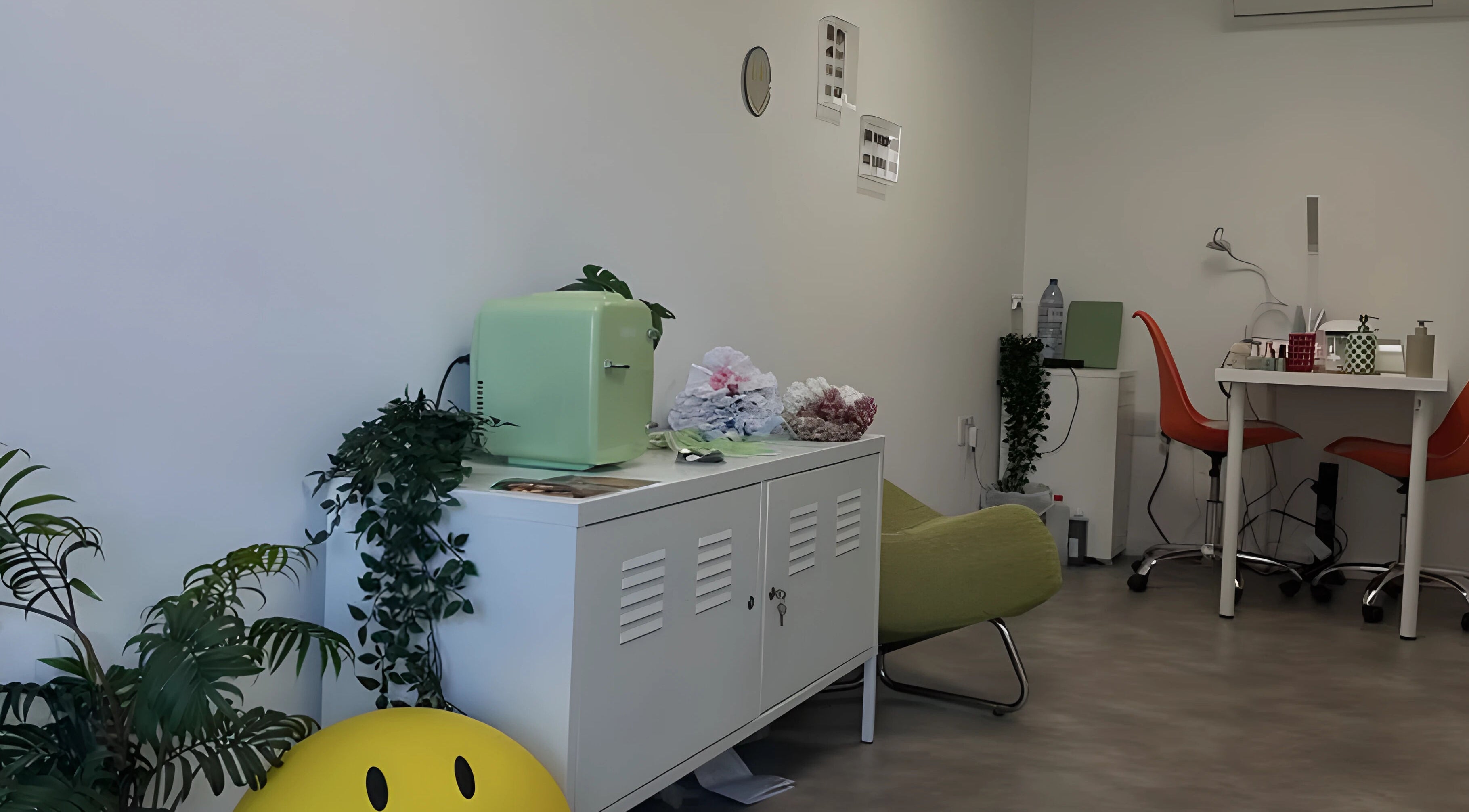 Modern and cozy nail salon interior at Suki Nailz, London, England, GB, featuring stylish decor and seating.