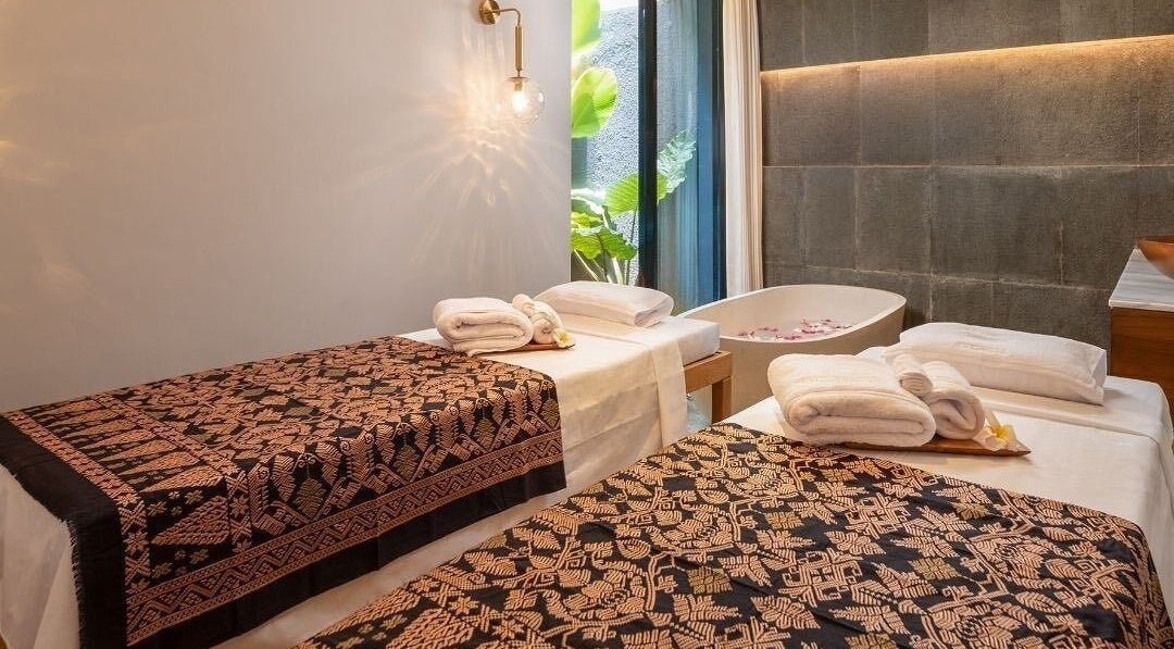 Relaxing massage room at Ame Spa Bali in Bali, Bali, ID with twin beds and a serene ambiance.
