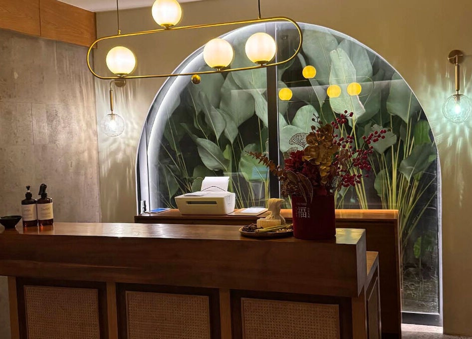 Elegant reception area at Ame Spa Bali with stylish decor and ambient lighting, located in Bali, Bali, ID.