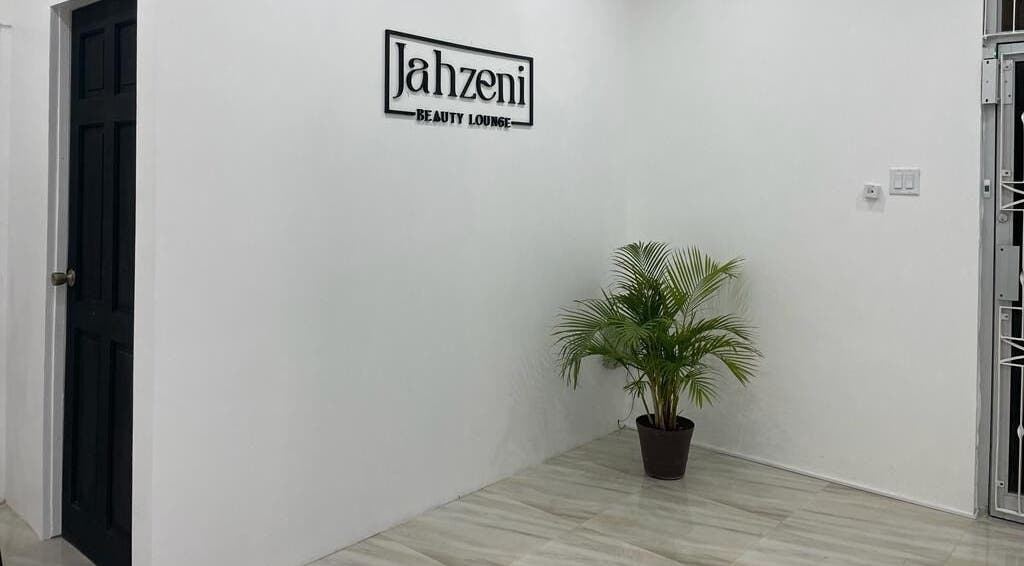 Entrance of Jahzeni Beauty Lounge with plant decor in Runaway Bay, St. Ann Parish, JM.