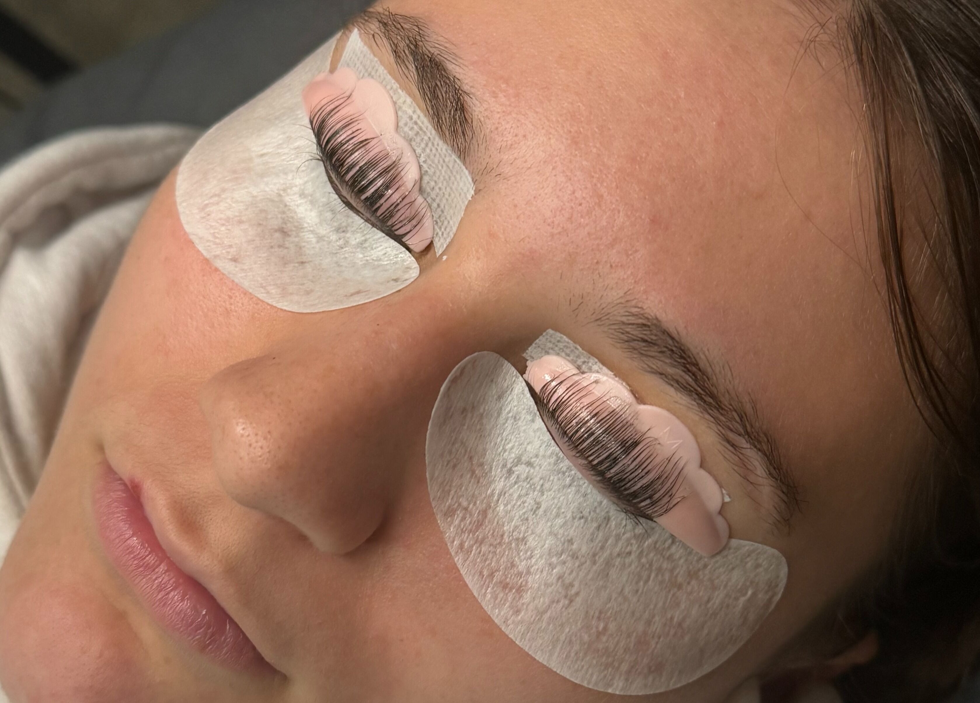 Lash treatment at Wild Winx Esthetics, Phoenix, Arizona, US. Eyelashes lifted and separated using special pads.