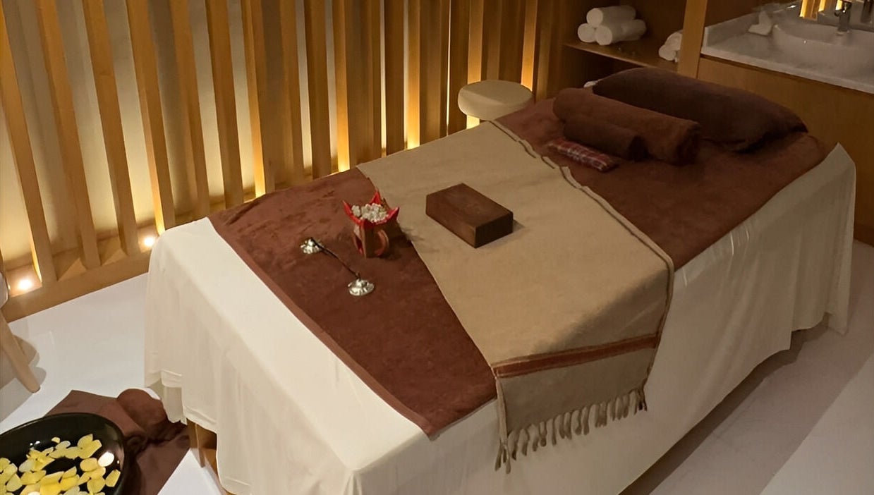 Massage table at Galo Spa, صلالة, محافظة ظفار, OM, with soft lighting and soothing ambiance.