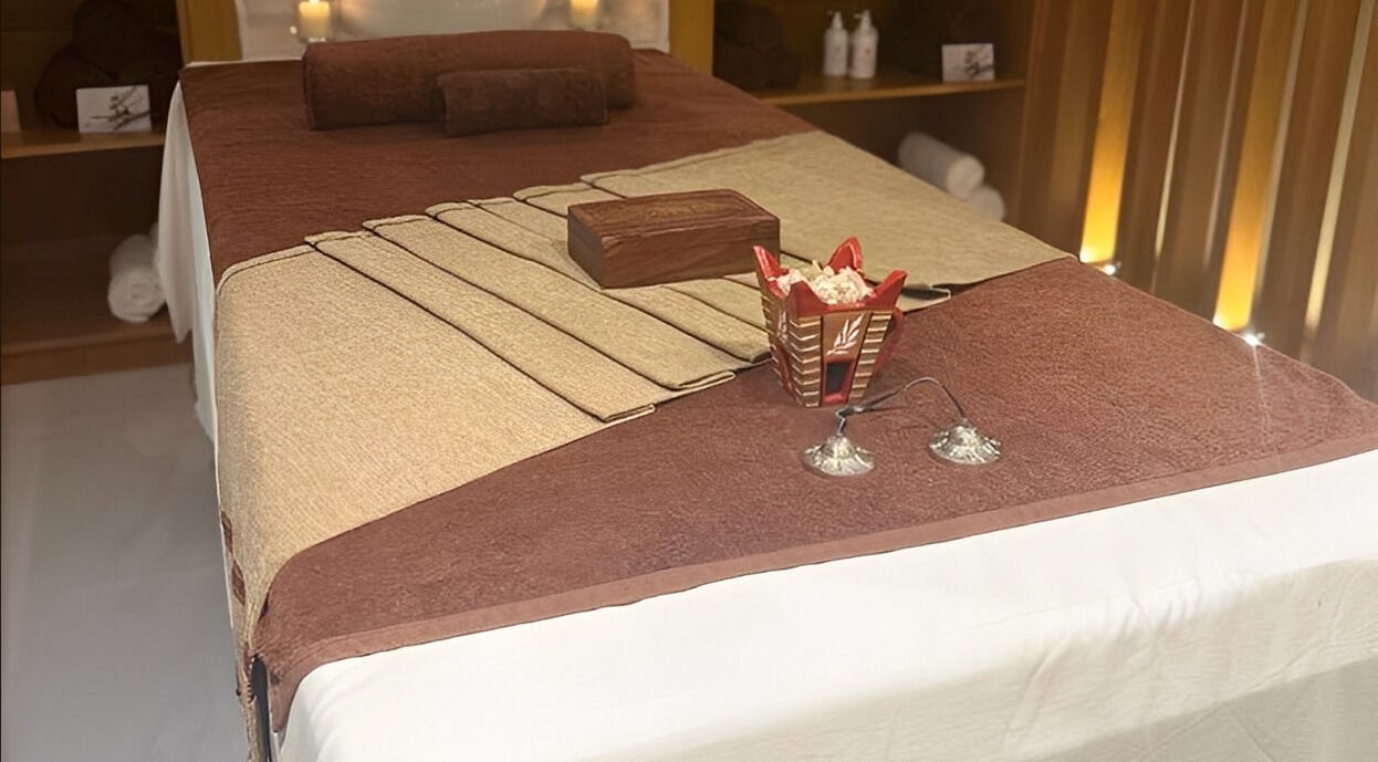 Luxurious massage table setup at Galo Spa, صلالة, محافظة ظفار, OM, featuring a peaceful ambiance.