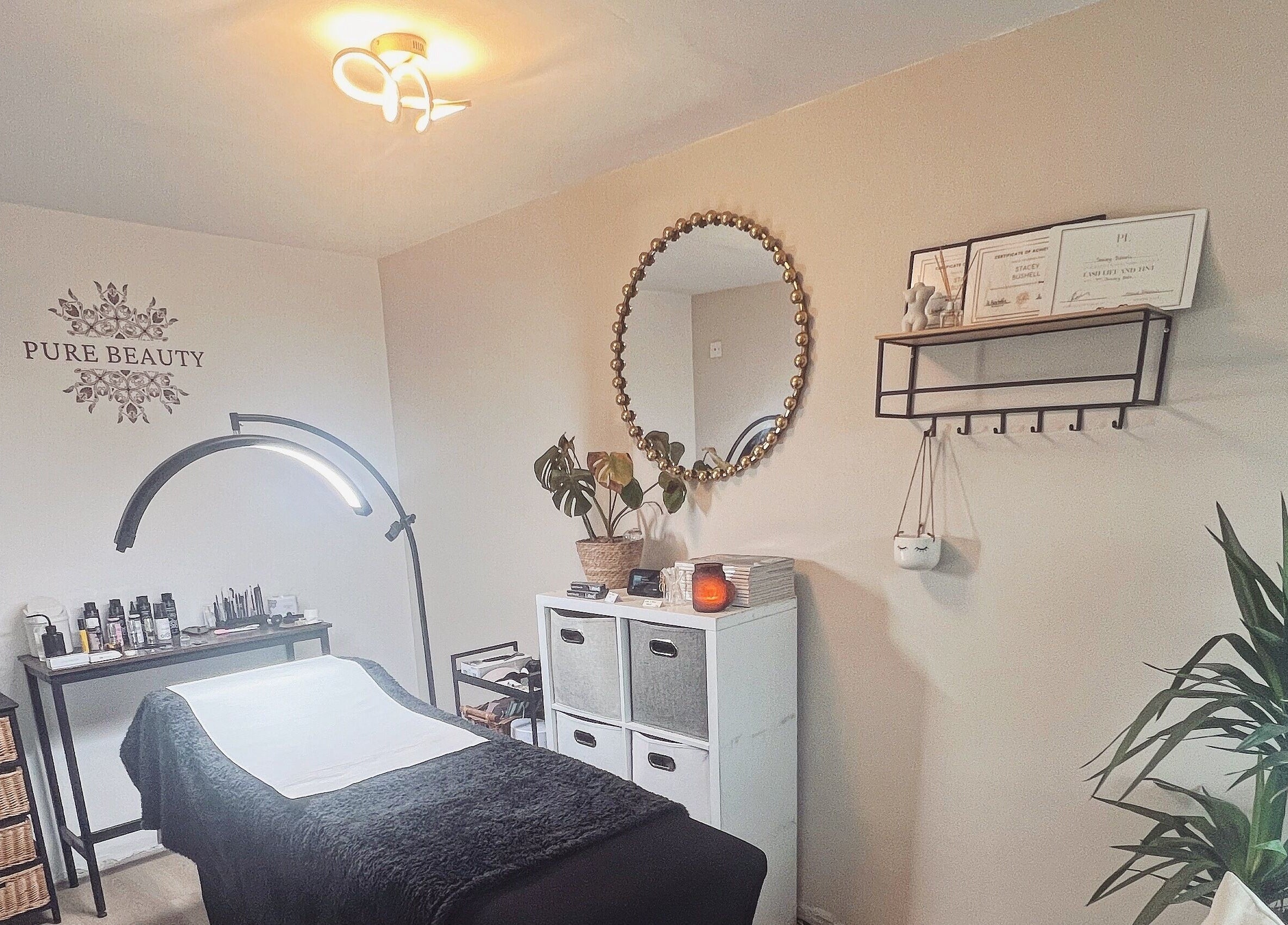 Relaxing treatment room at PURE BEAUTY, Weston Super Mare, England, GB with calming decor and ambiance.