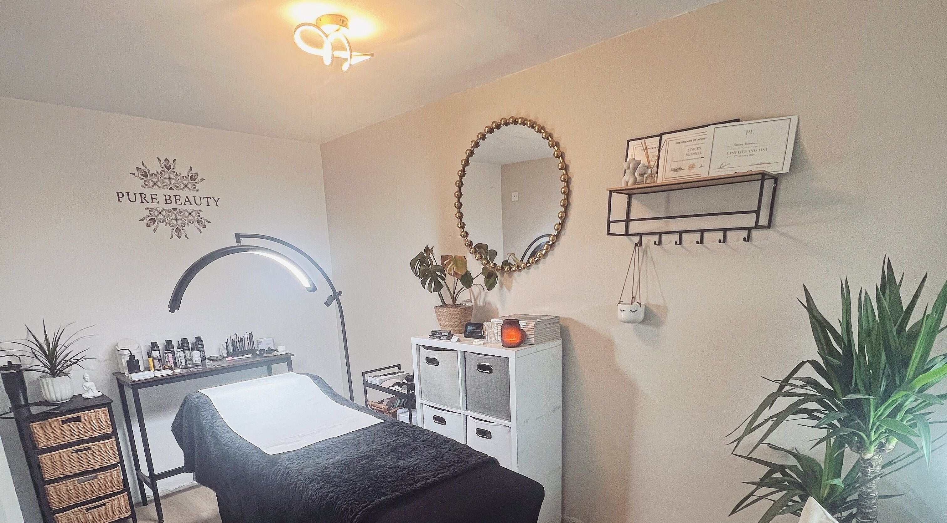 Relaxing treatment room at PURE BEAUTY, Weston Super Mare, England, GB with calming decor and ambiance.