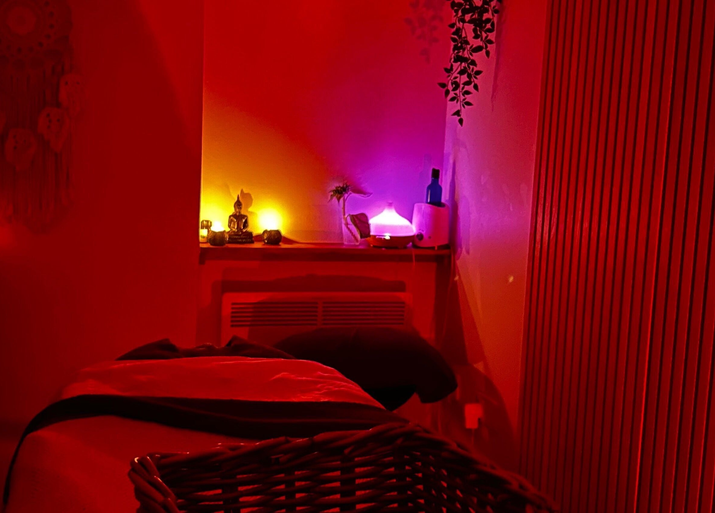 Relaxing massage room with warm lighting at The Soul Sanctuary, Garstang, England, GB, promising serenity and peace.
