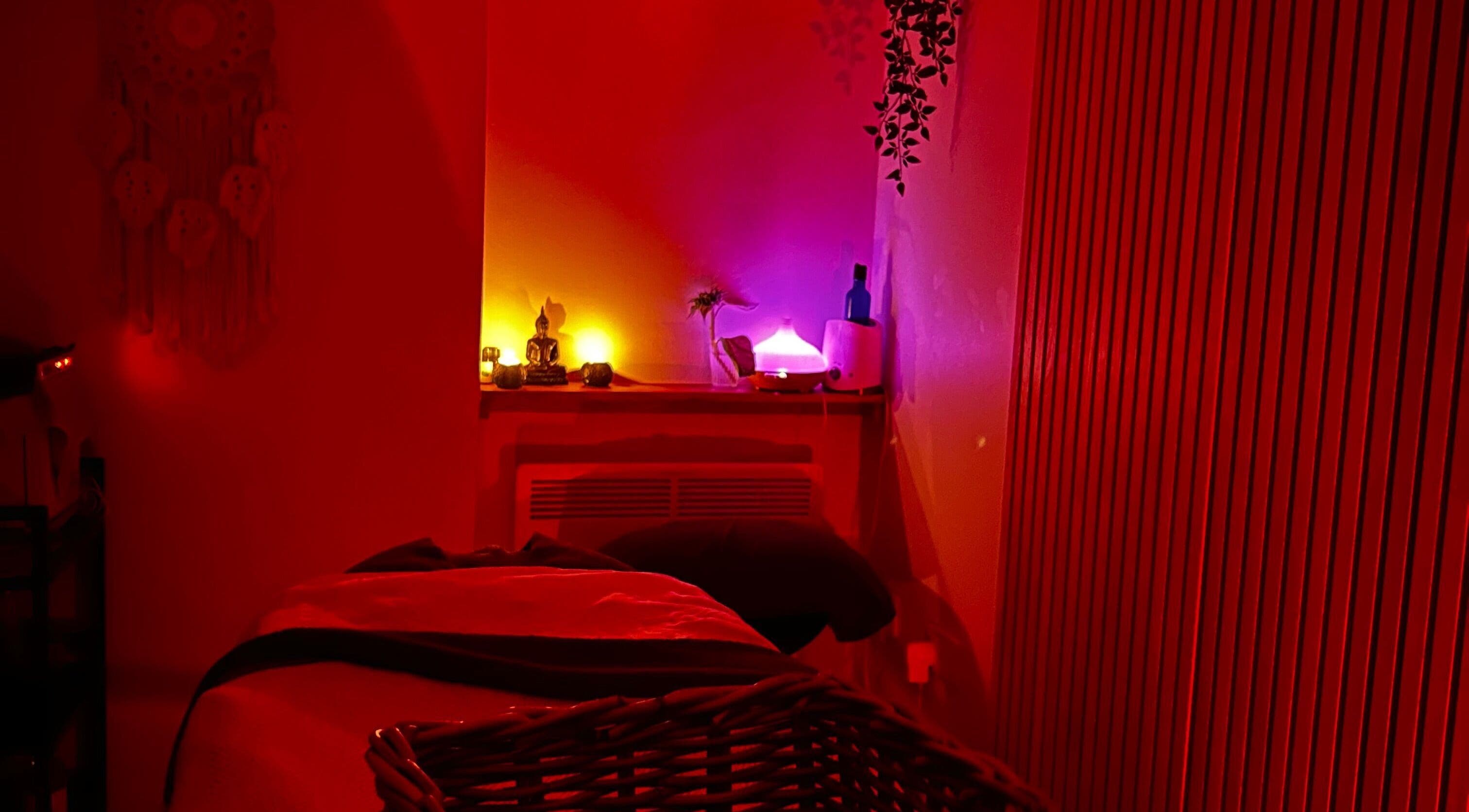 Relaxing massage room with warm lighting at The Soul Sanctuary, Garstang, England, GB, promising serenity and peace.