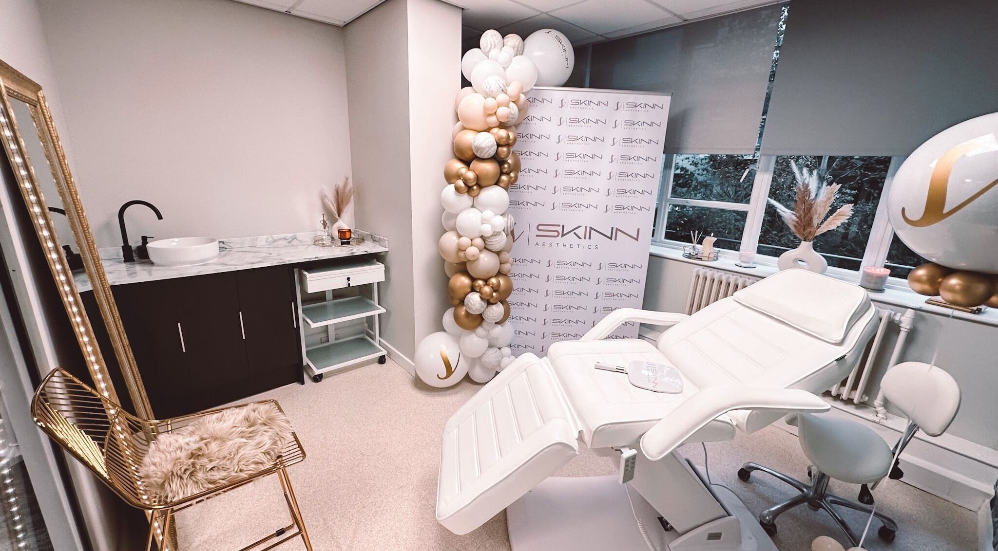 Luxurious treatment room at Skinn Aesthetics LTD in Liverpool, England, GB with plush decor and modern furniture.