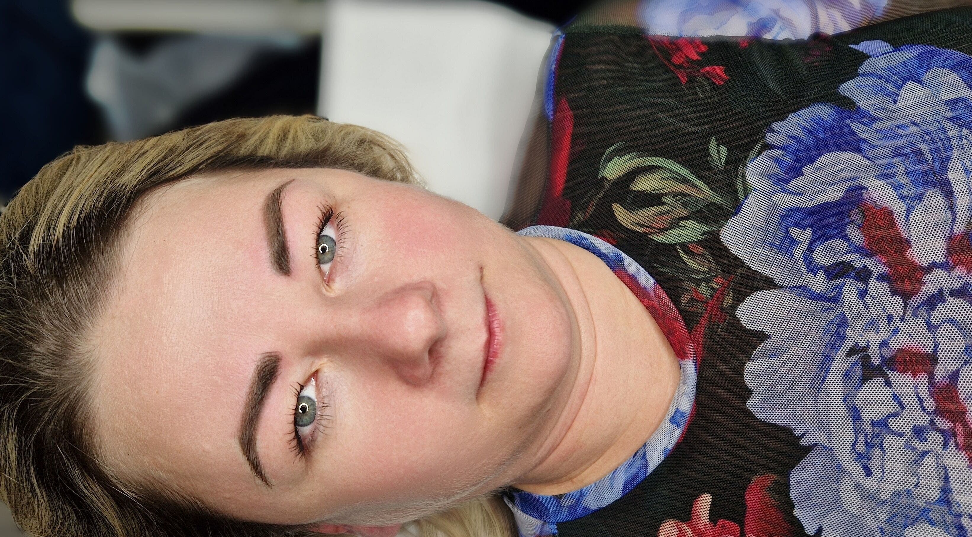 Client displays natural, enhanced brows at Glow-Permanent Makeup Studio, Rugby, England, GB.