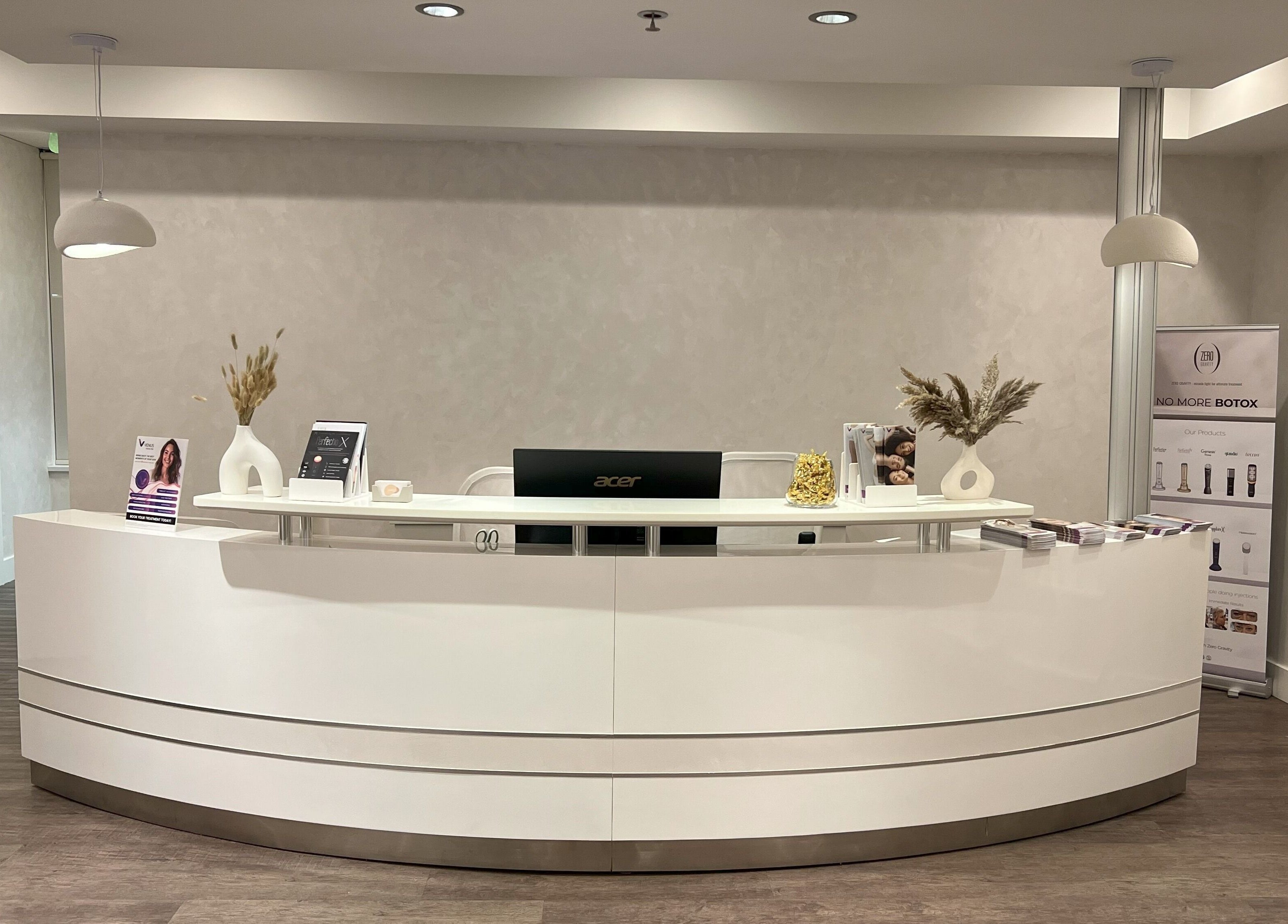Elegant reception at Oasis Aesthetics Spa - Marine, West Vancouver, British Columbia, CA with modern decor.