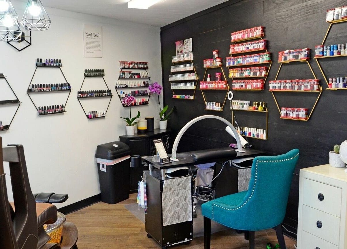Nail polish displays at JEM Luxe Salon LLC in Coloma, Michigan, US, showcasing vibrant beauty and wellness.