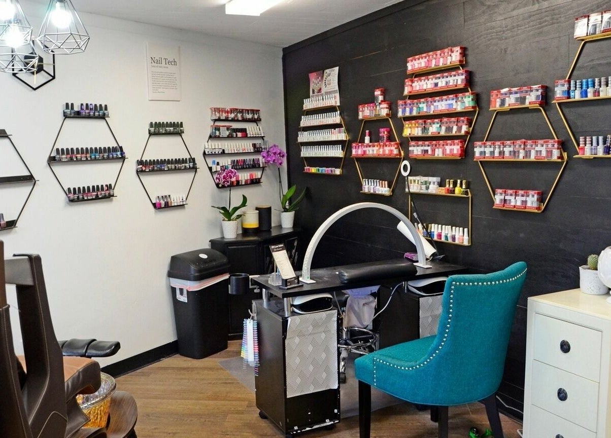 Nail polish displays at JEM Luxe Salon LLC in Coloma, Michigan, US, showcasing vibrant beauty and wellness.