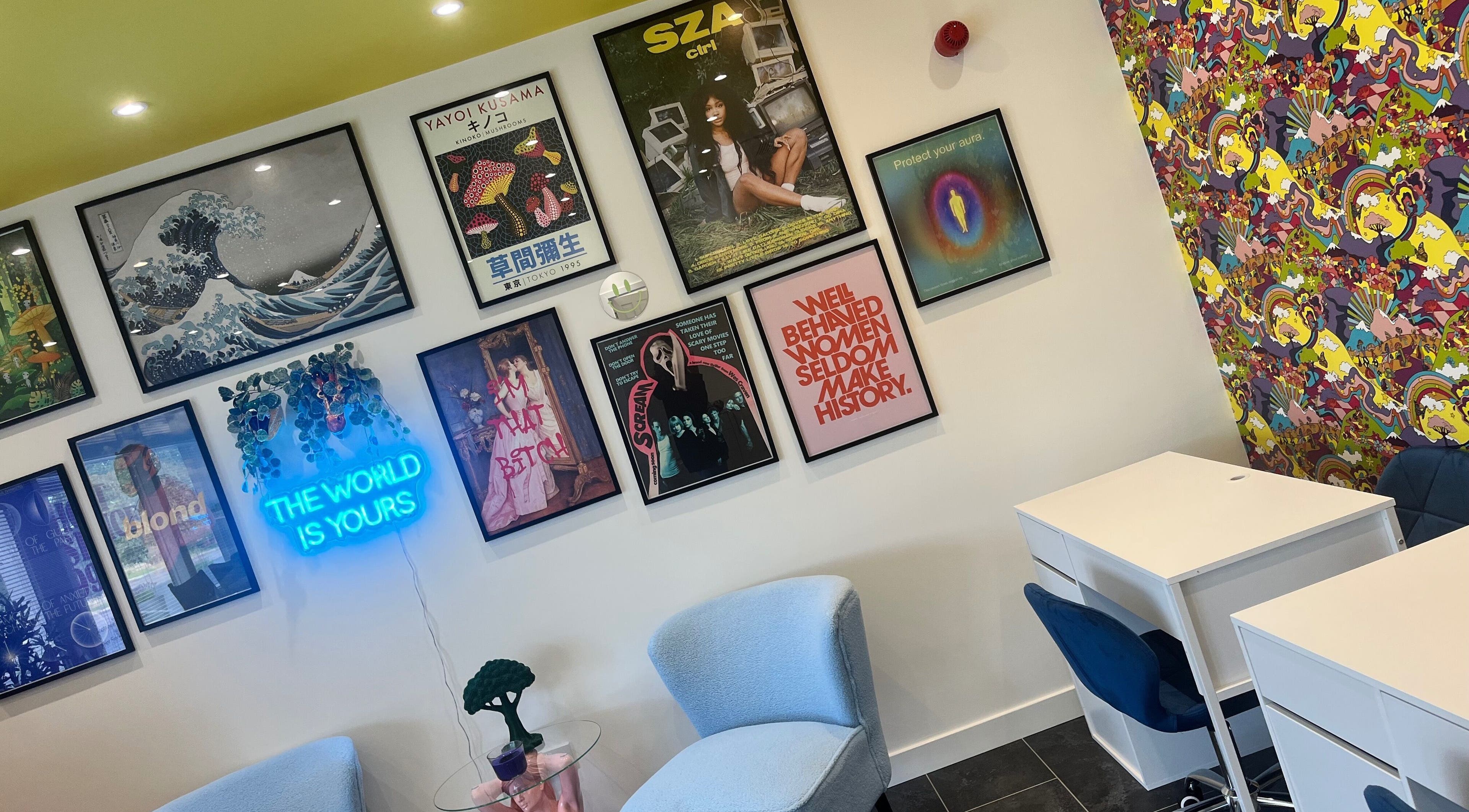 Vibrant interior of SPMU & Lashes by Klaudia in Livingston, Scotland, GB. Stylish decor with art and neon sign.