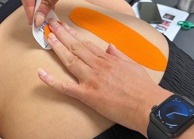 Kinesiology tape application at High Pavement House, Sutton-in-Ashfield, England, GB.