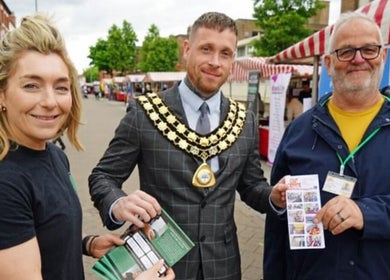 Visitors enjoying a vibrant market near High Pavement House, Sutton-in-Ashfield, England, GB.