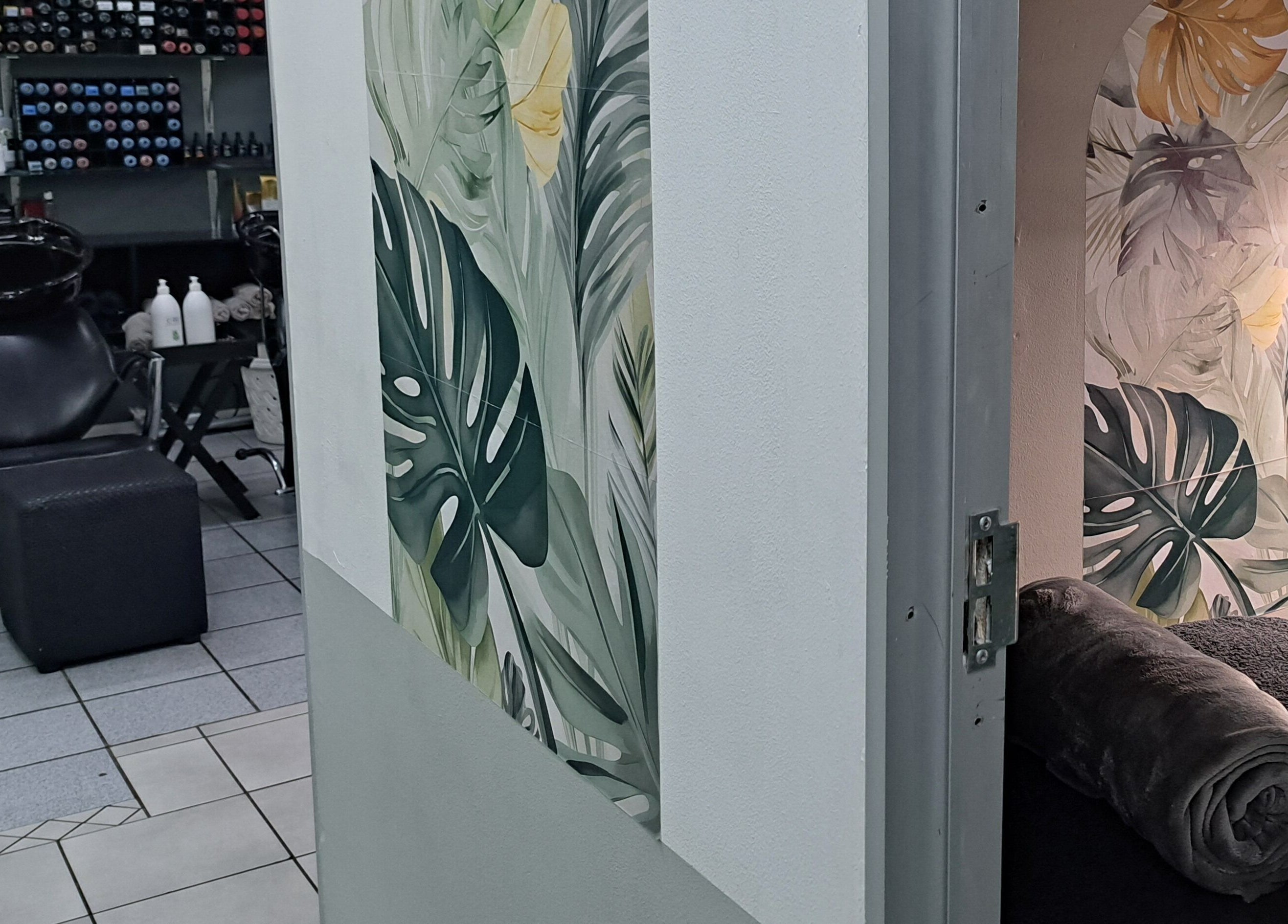 Cozy treatment area at Le Lash and Brow Artist in Cape Town, Western Cape, ZA with tropical decor.