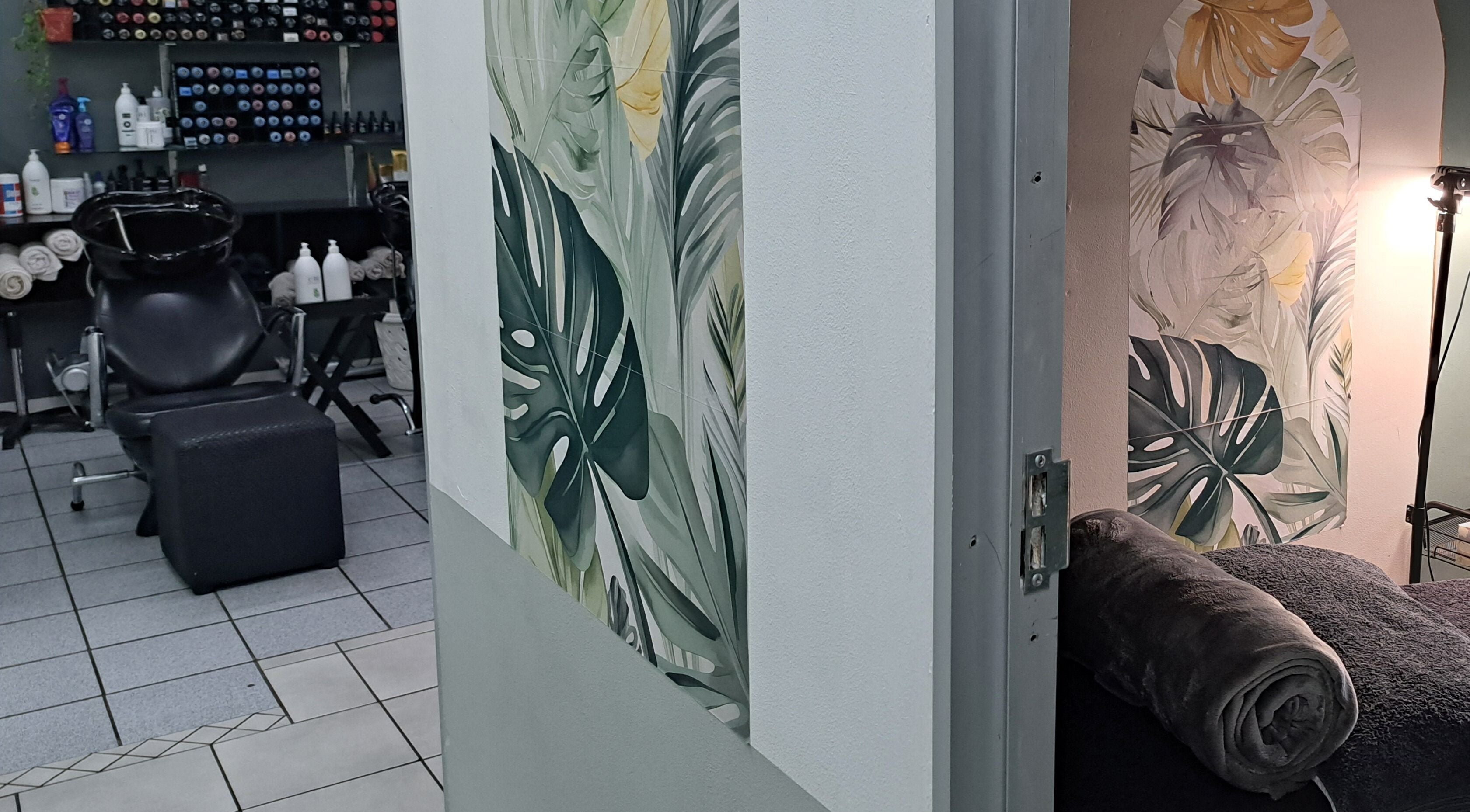 Cozy treatment area at Le Lash and Brow Artist in Cape Town, Western Cape, ZA with tropical decor.