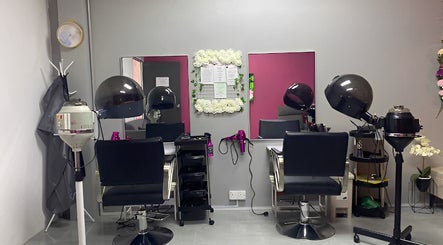 Modern salon chairs and hair dryers at Allurv, Kota Bharu, Kelantan, MY offer a chic atmosphere.