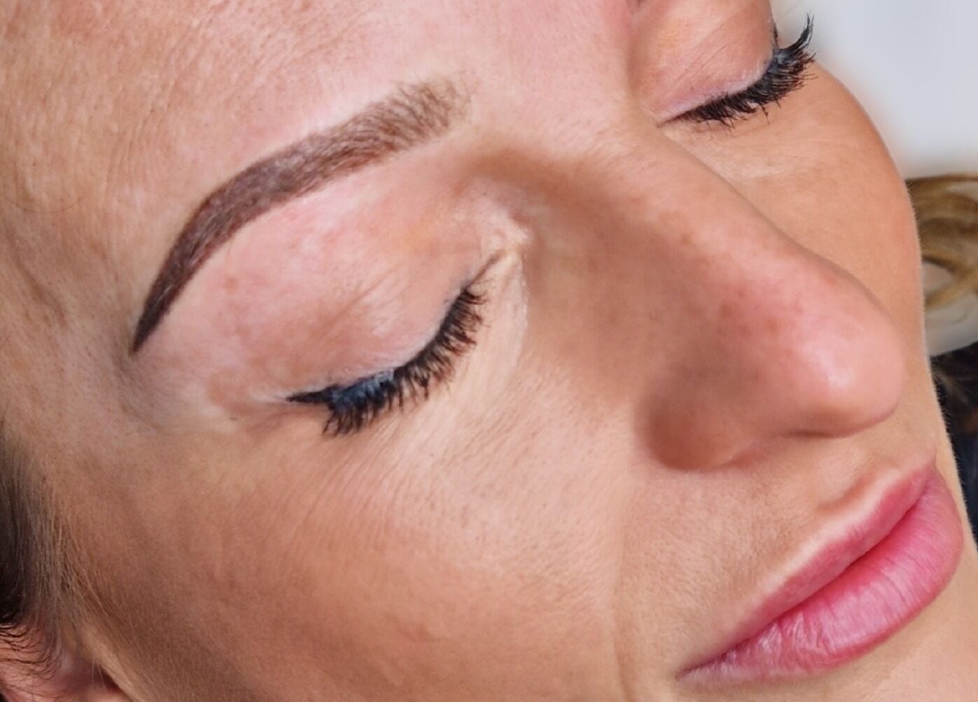 Close-up of flawless brows and lashes at Contour & Glow by Sej, Wellingborough, England, GB.