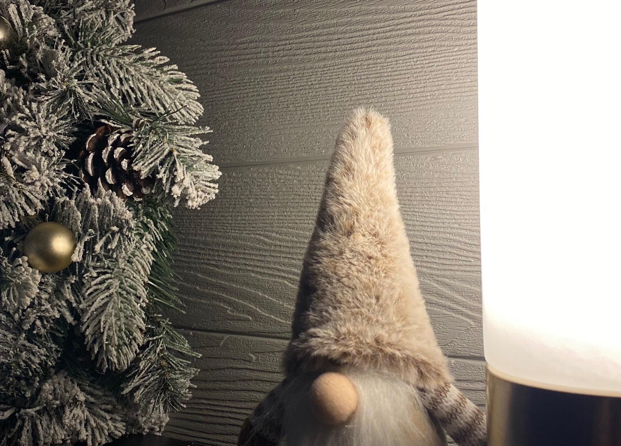 Festive decor with frosted pine and gnome at Healing Muscles Northampton, Overstone, England, GB.
