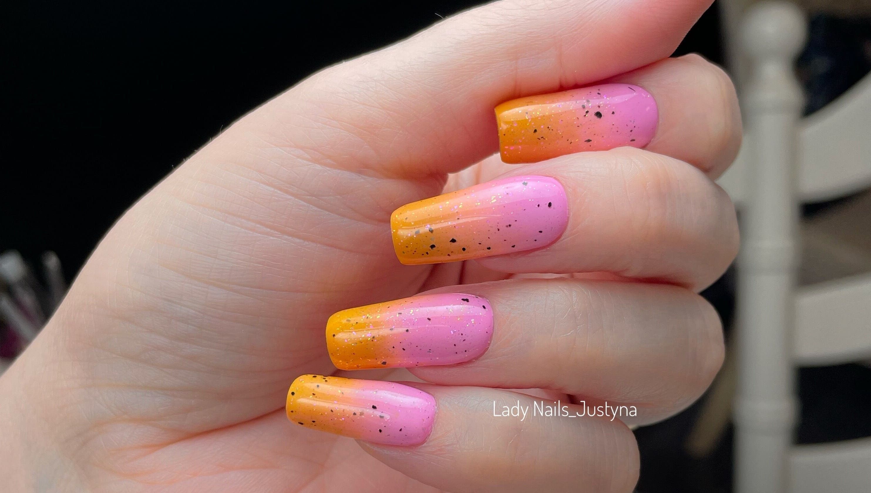 Vibrant sunset nail art at Lady Nails Justyna, Cork, County Cork, IE, showcasing pink to orange gradient.