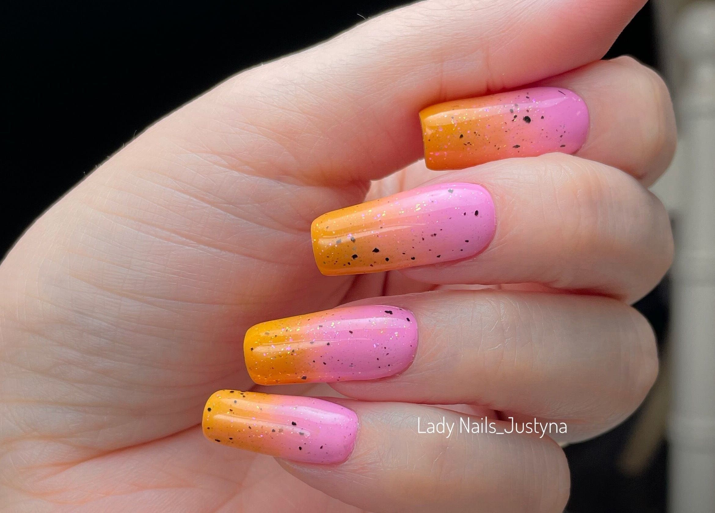Vibrant sunset nail art at Lady Nails Justyna, Cork, County Cork, IE, showcasing pink to orange gradient.