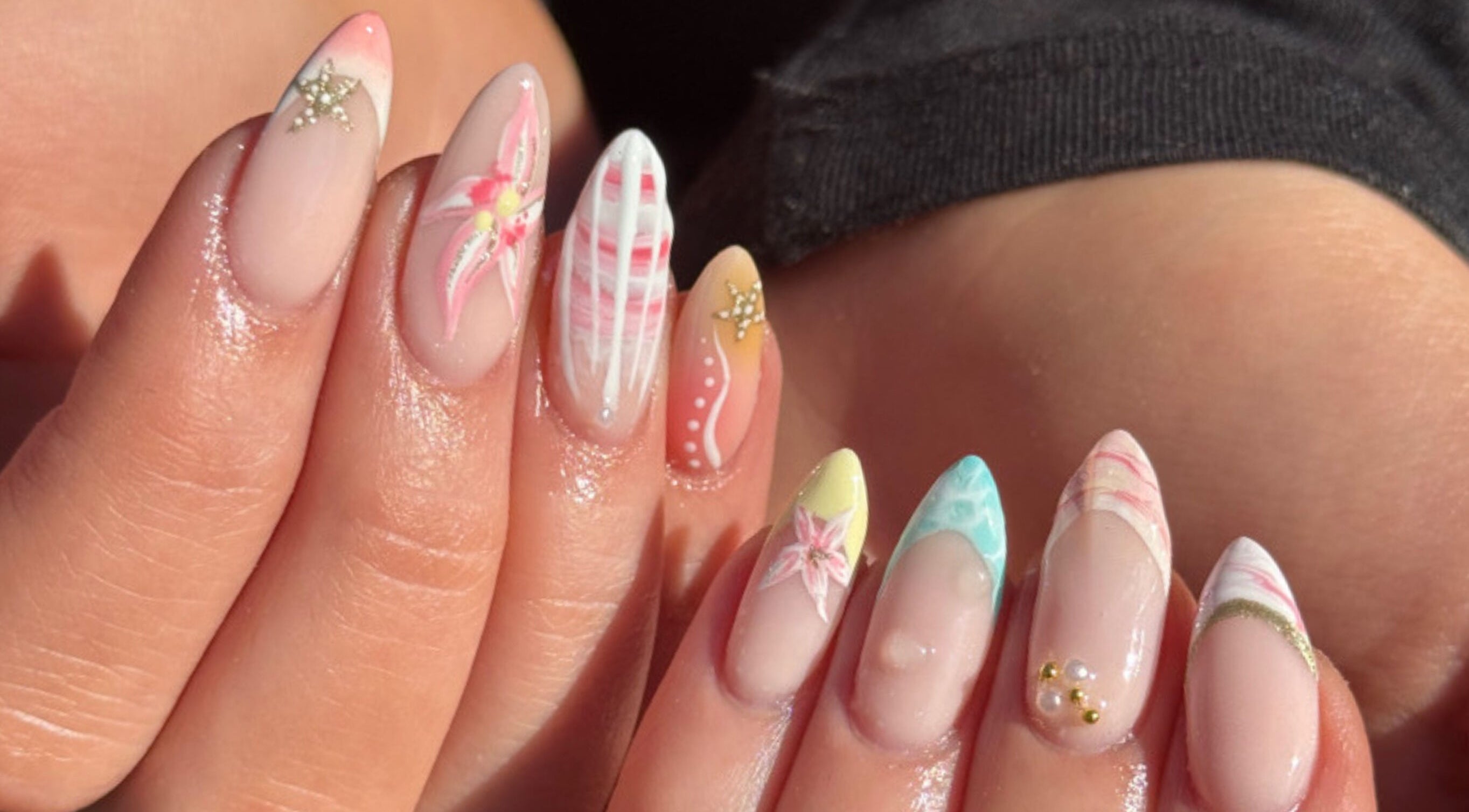 Stylish nail art with pastel colors at Eleven Beauty Studio, Keighley, England, GB.