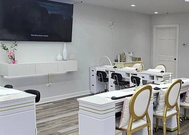 Interior of Plush Nail Salon Ii in Glenview, Illinois, US featuring modern nail stations and elegant decor.