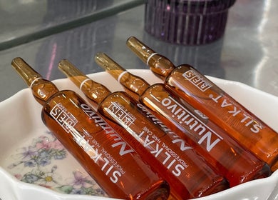 Luxurious serums on display at Beauty From The Heart, Belper, England, GB, showcasing premium skincare.