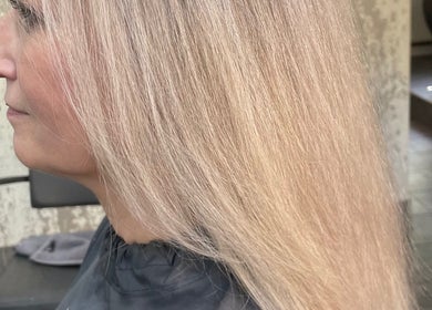 Smooth blonde hair styled at Beauty From The Heart, Belper, England, GB, showcasing expert salon craftsmanship.