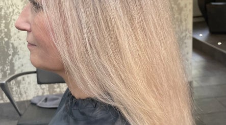 Smooth blonde hair styled at Beauty From The Heart, Belper, England, GB, showcasing expert salon craftsmanship.