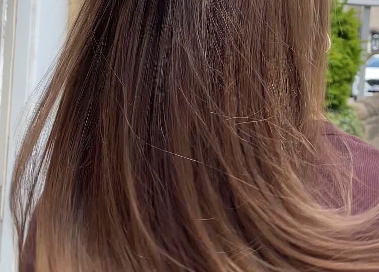 Flowing brown hair at Beauty From The Heart in Belper, England, GB.