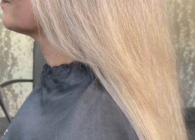 Flawlessly straightened blonde hair at Beauty From The Heart, Belper, England, GB.