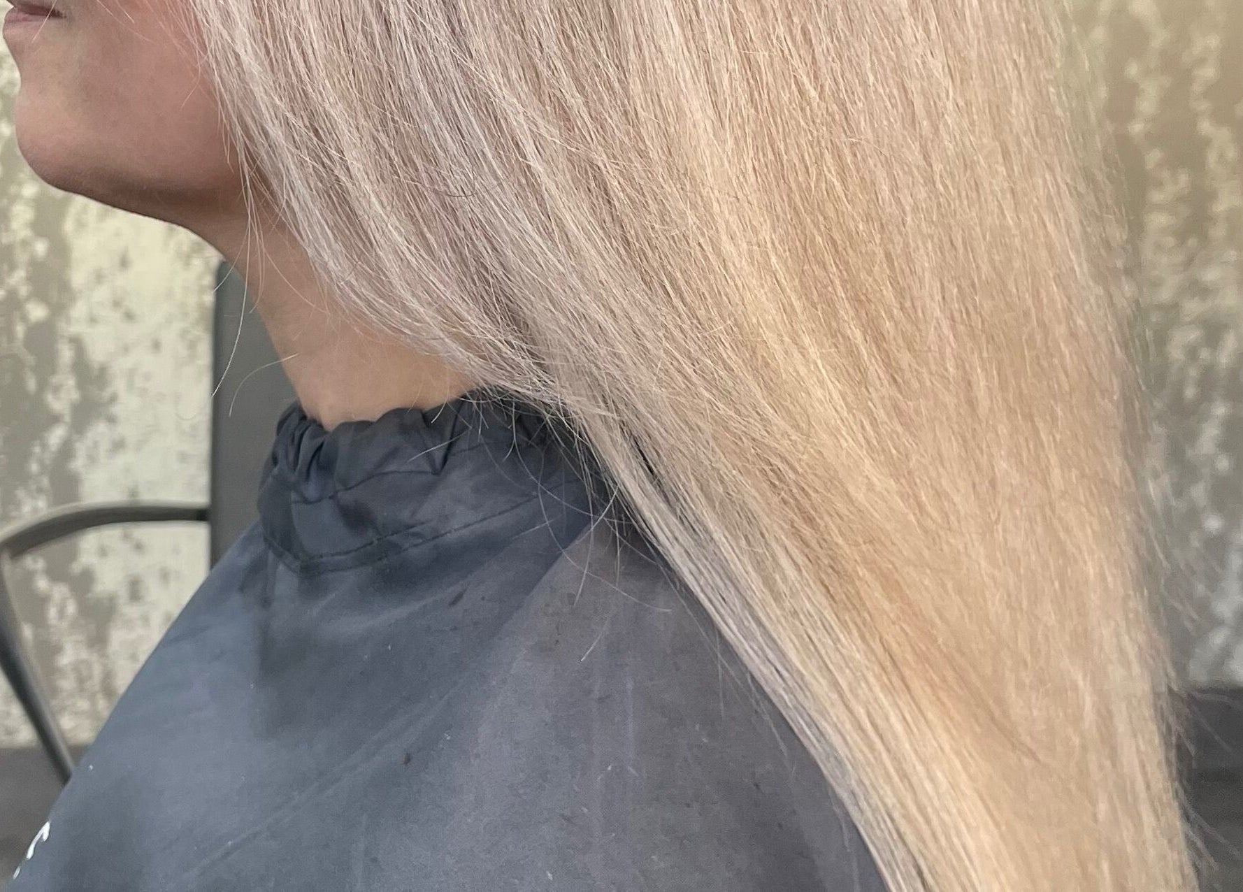 Flawlessly straightened blonde hair at Beauty From The Heart, Belper, England, GB.