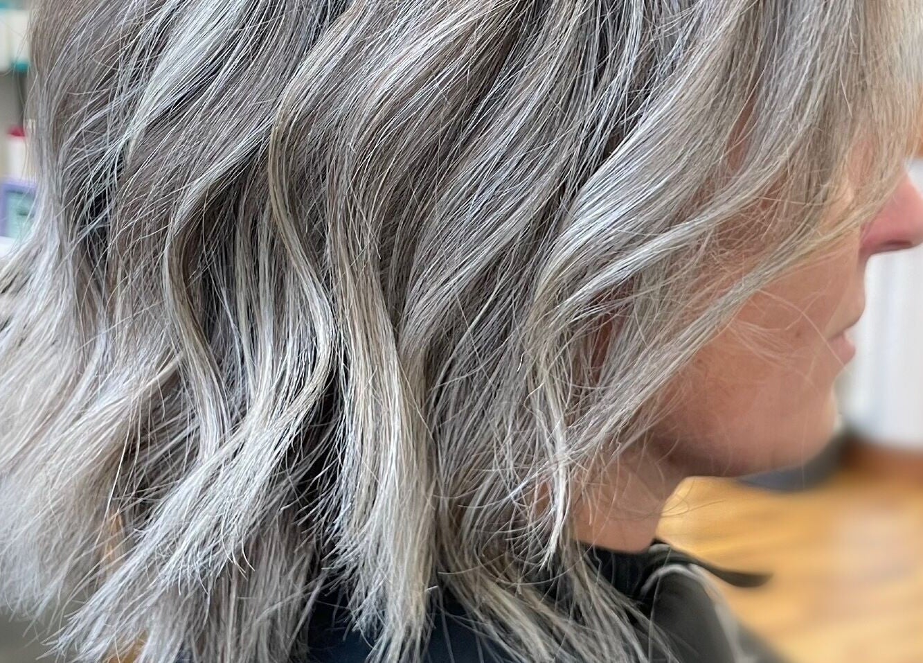 Stylish gray hair transformation at Beauty From The Heart in Belper, England, GB showcasing chic waves.