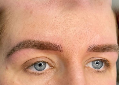 Detailed view of expertly shaped eyebrows at Alexandra Beauty, Norwich, England, GB.