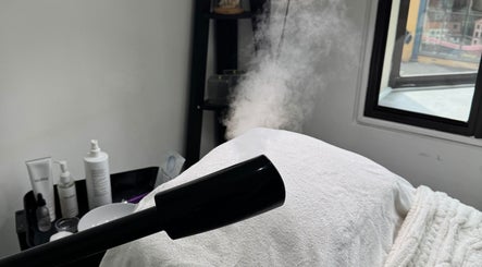 Steaming facial treatment room at Alexandra Beauty, Norwich, England, GB, showcasing spa atmosphere.
