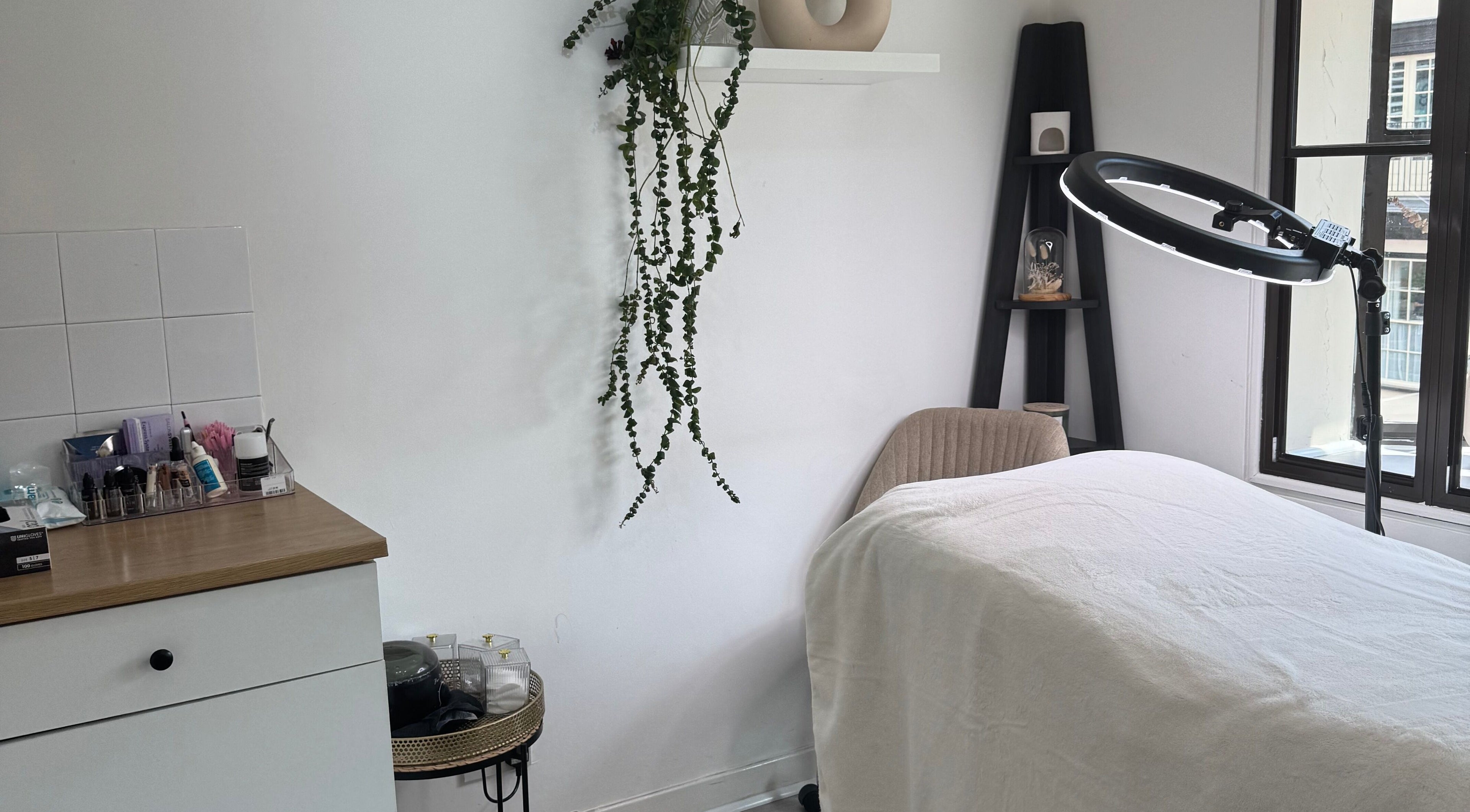 Tranquil treatment room at Alexandra Beauty in Norwich, England, GB, featuring modern decor and natural light.