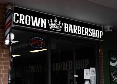 Crown Barbershop Blacktown in New South Wales features a welcoming entrance with vibrant signage.