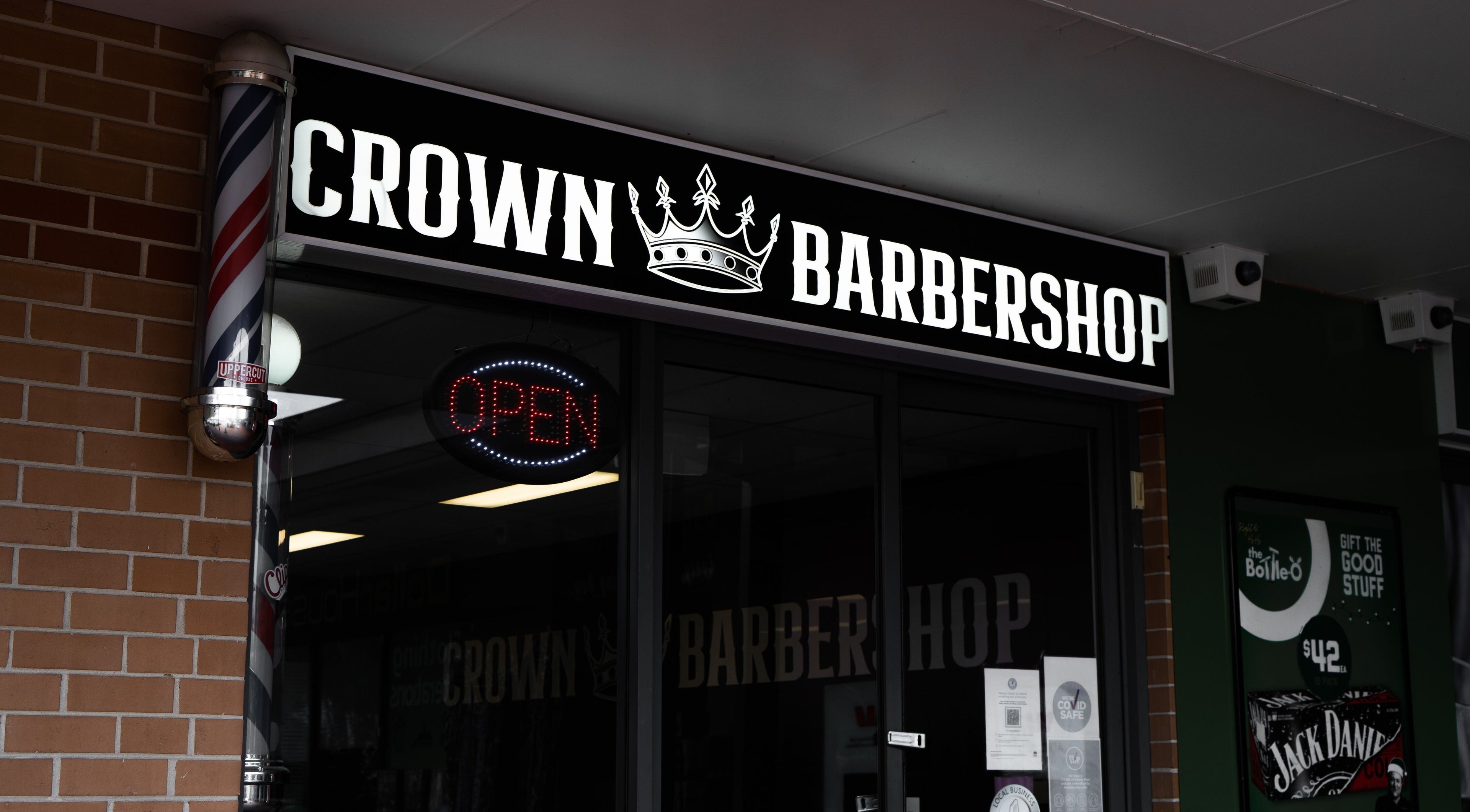 Crown Barbershop Blacktown in New South Wales features a welcoming entrance with vibrant signage.