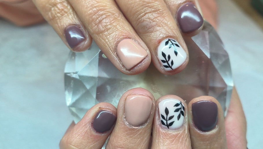Stylishly manicured nails at Cute Icles in Ceres, Western Cape, ZA, showcasing chic nail art designs.