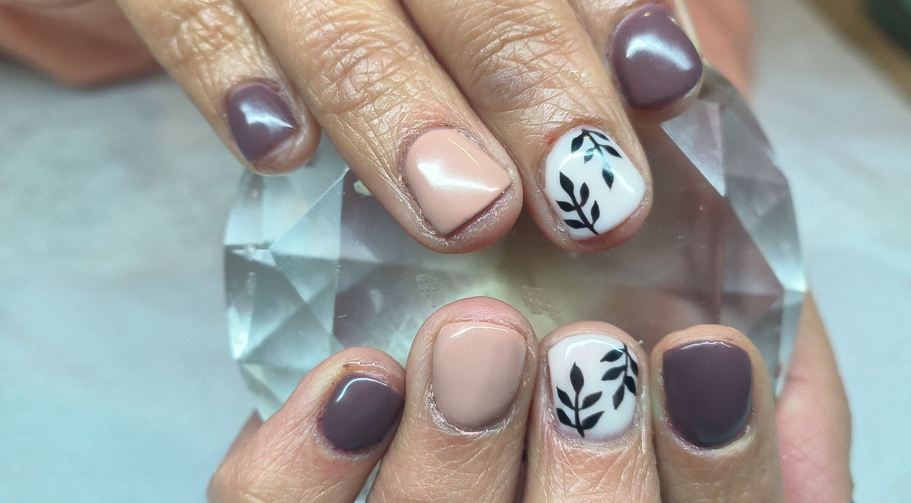 Stylishly manicured nails at Cute Icles in Ceres, Western Cape, ZA, showcasing chic nail art designs.