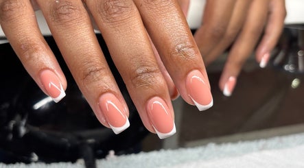 Elegant French manicure at Polished, Berea, Kwazulu-natal, ZA showcasing glossy nails.